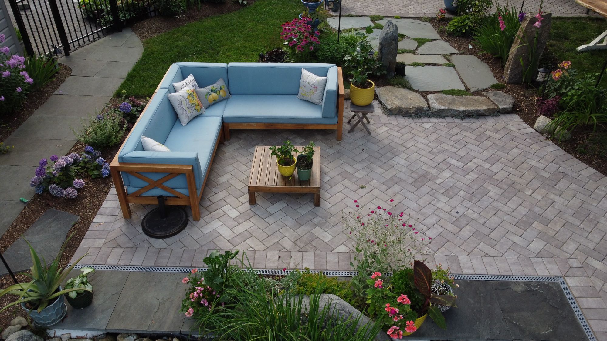 Arnold Ave project; paver patio and natural stone walkway with outdoor sectional