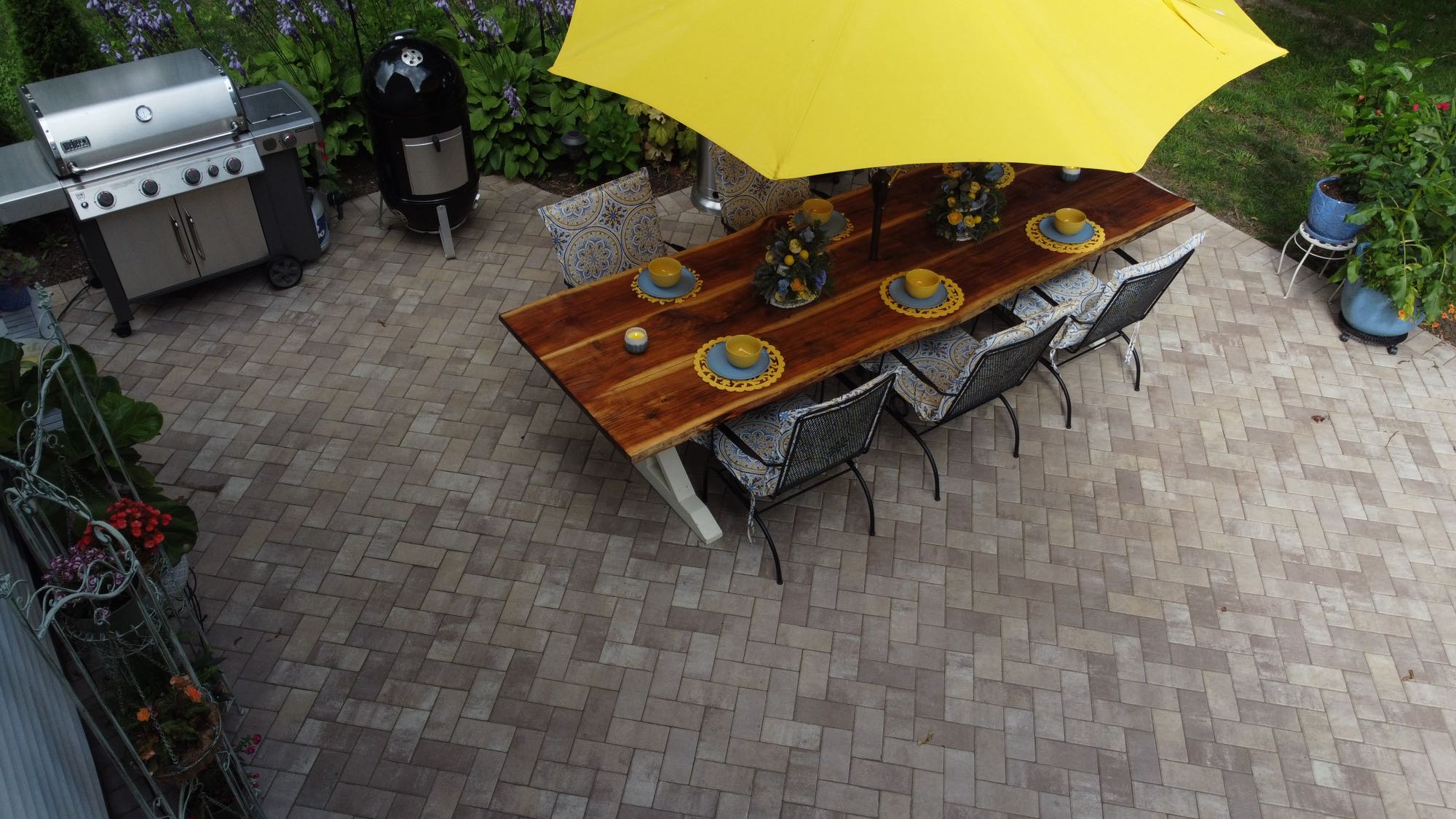 Arnold Ave project; paver patio with grill and dining set