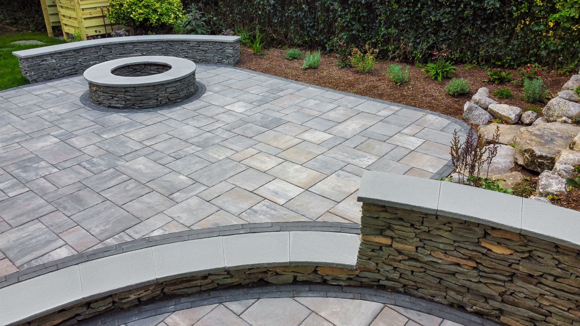 Wolcott Ave project; paver patio with two levels and built-in fire pit