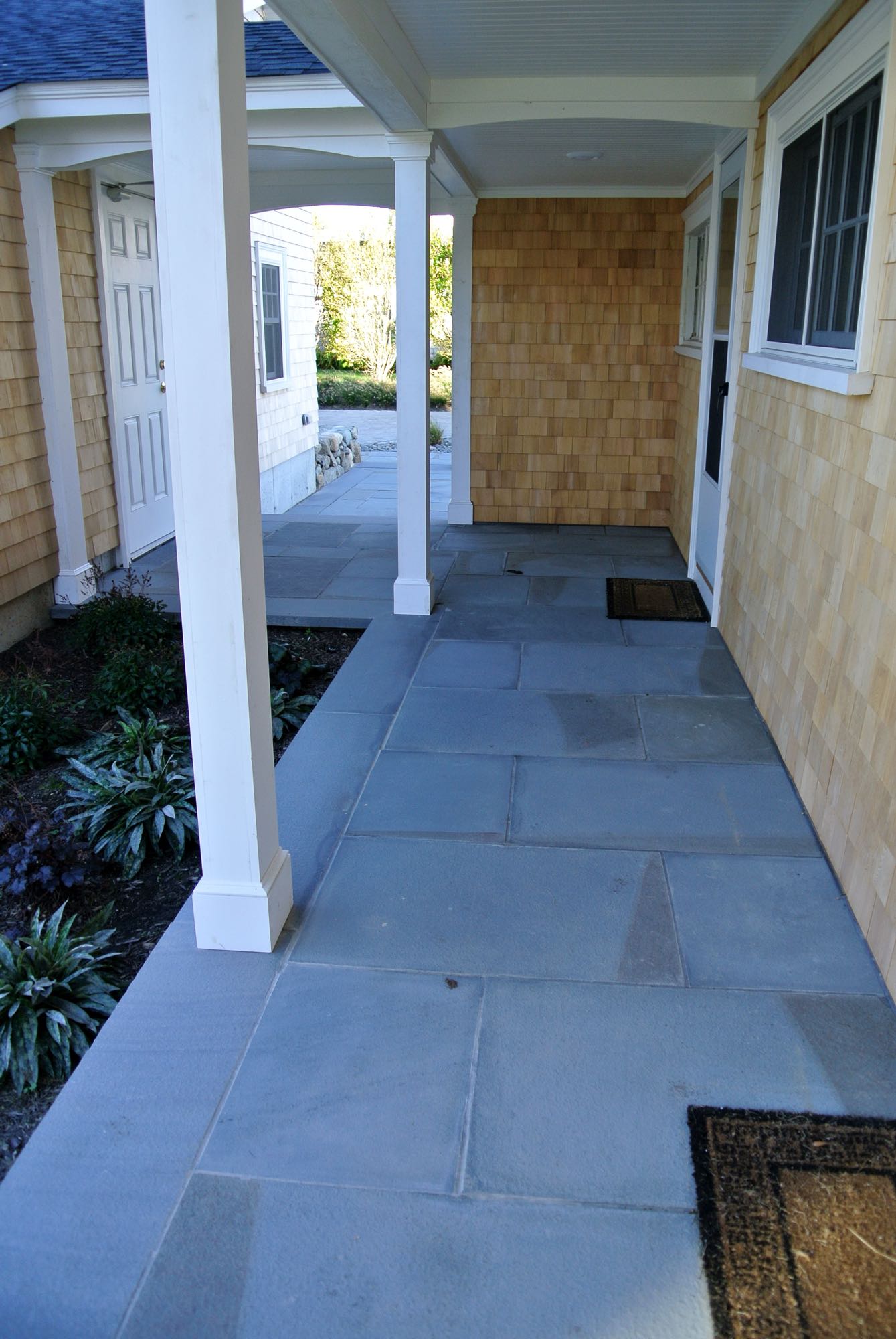 Wawaloam project; stone porch walkway