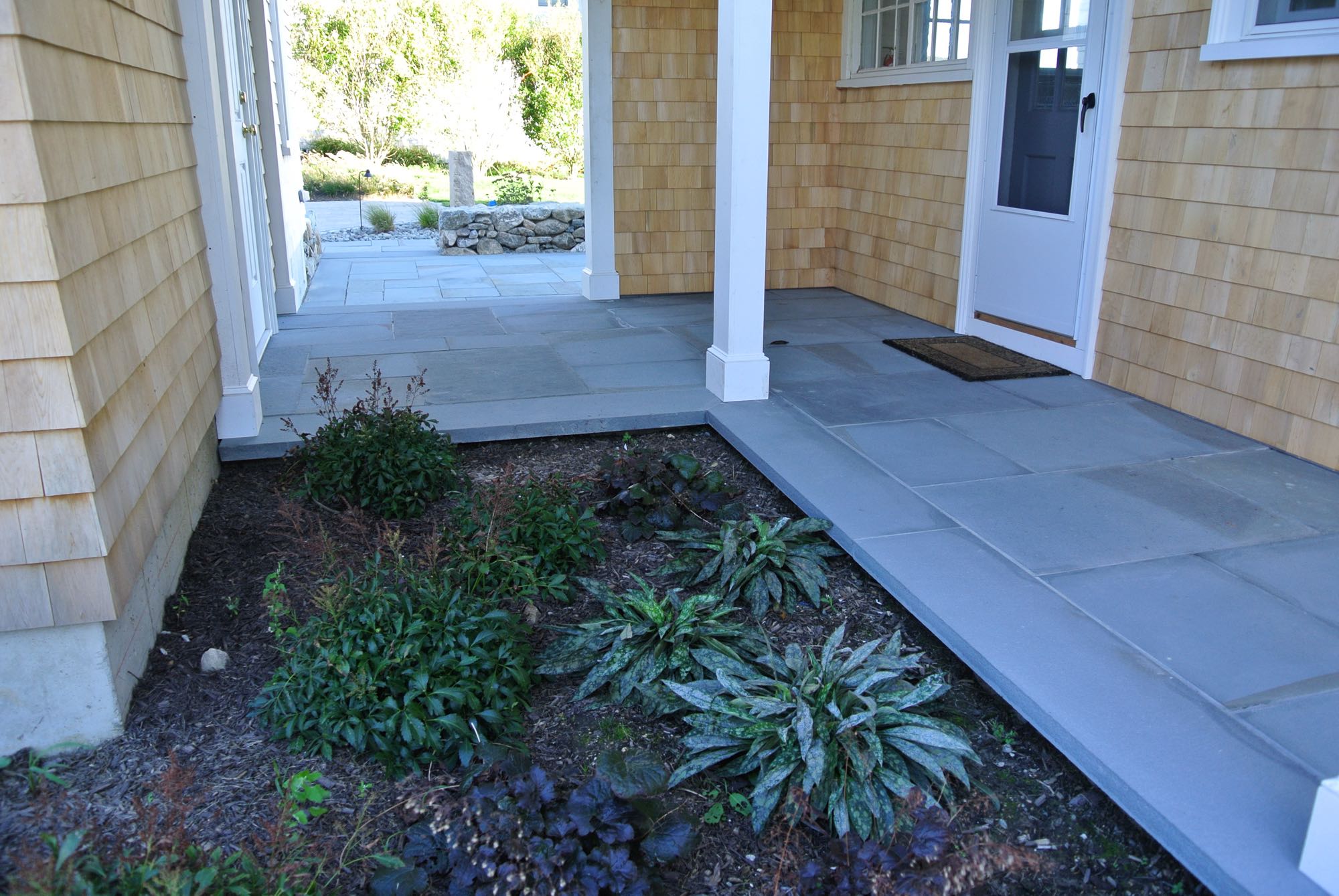 Wawaloam project; stone porch walkway